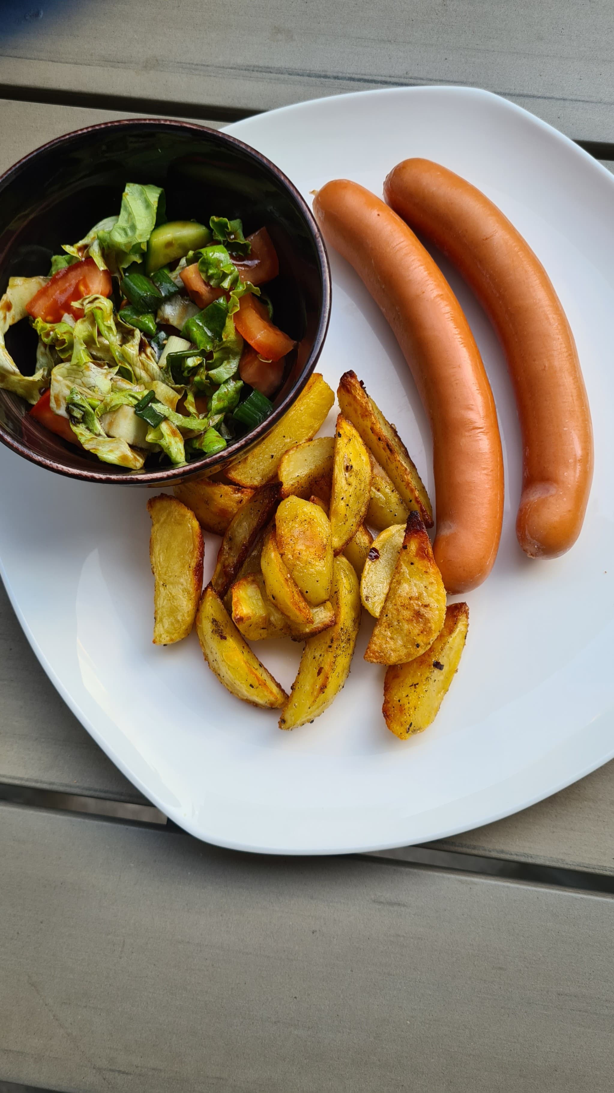 Sausages with Baked Potatoes and Fresh Salad Recipe Image
