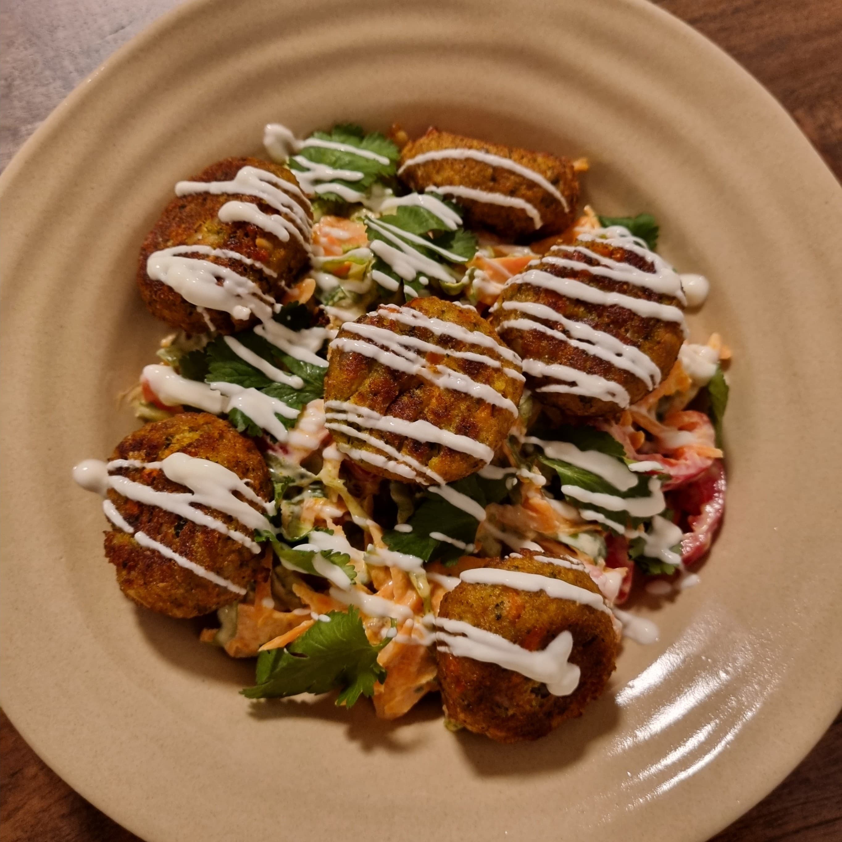 Fresh Salad with Yogurt Dressing and Quinoa Balls Recipe Image